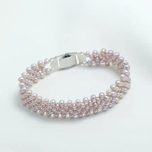 S115 Alça de mão trançada Pérola barroca de água doce cultivada (3,5-4mm). Conjunto de pulseira elástica
