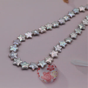 Pendientes de perlas barrocas con forma de estrella